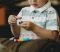 boy holding block toy